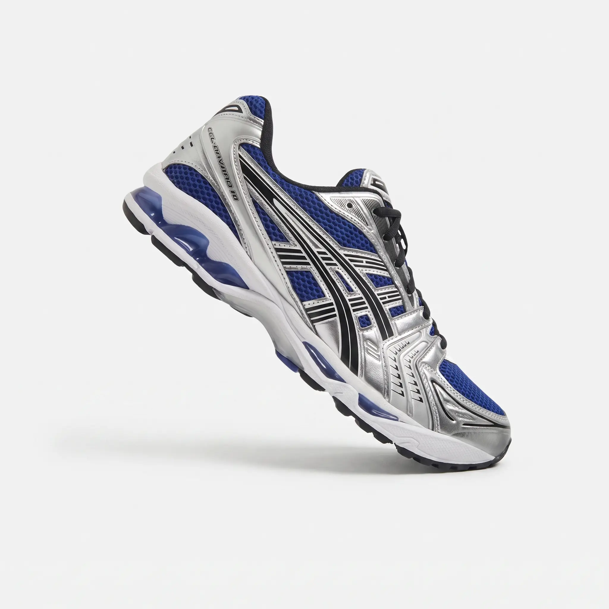 asics gel kayano 14 monaco blue side stylish view vorax Vista lateral das Asics Gel Kayano 14 Monaco Blue com acabamento premium