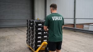 man pushing trolley with boxes 202607262002