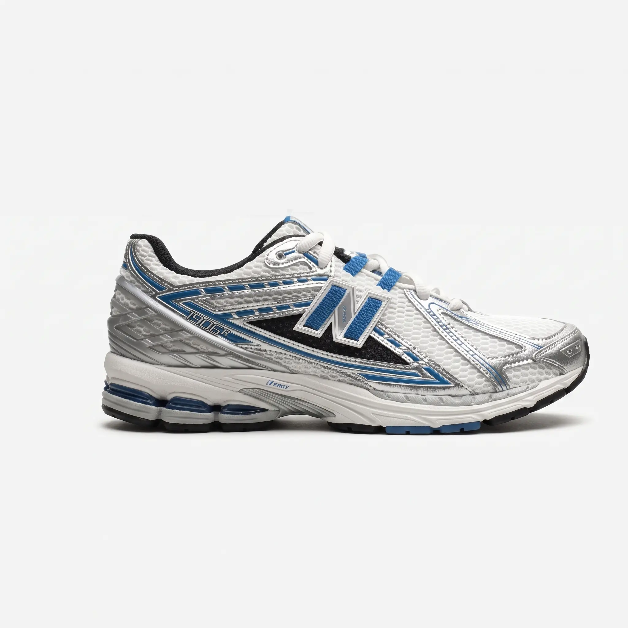 New Balance 1906R Panelled Sneakers – Vista Lateral Interior New Balance 1906R Panelled Sneakers vista lateral interior.