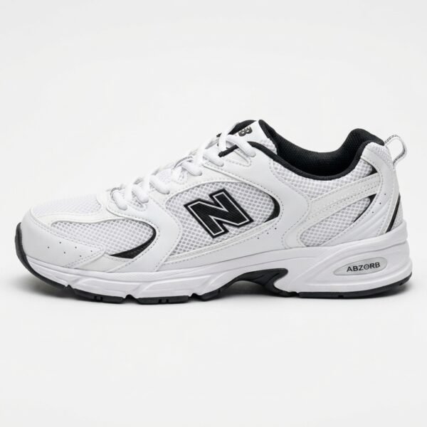 New Balance 530 White Black com tecnologia ABZORB®, mesh respirável e acabamento branco e preto.