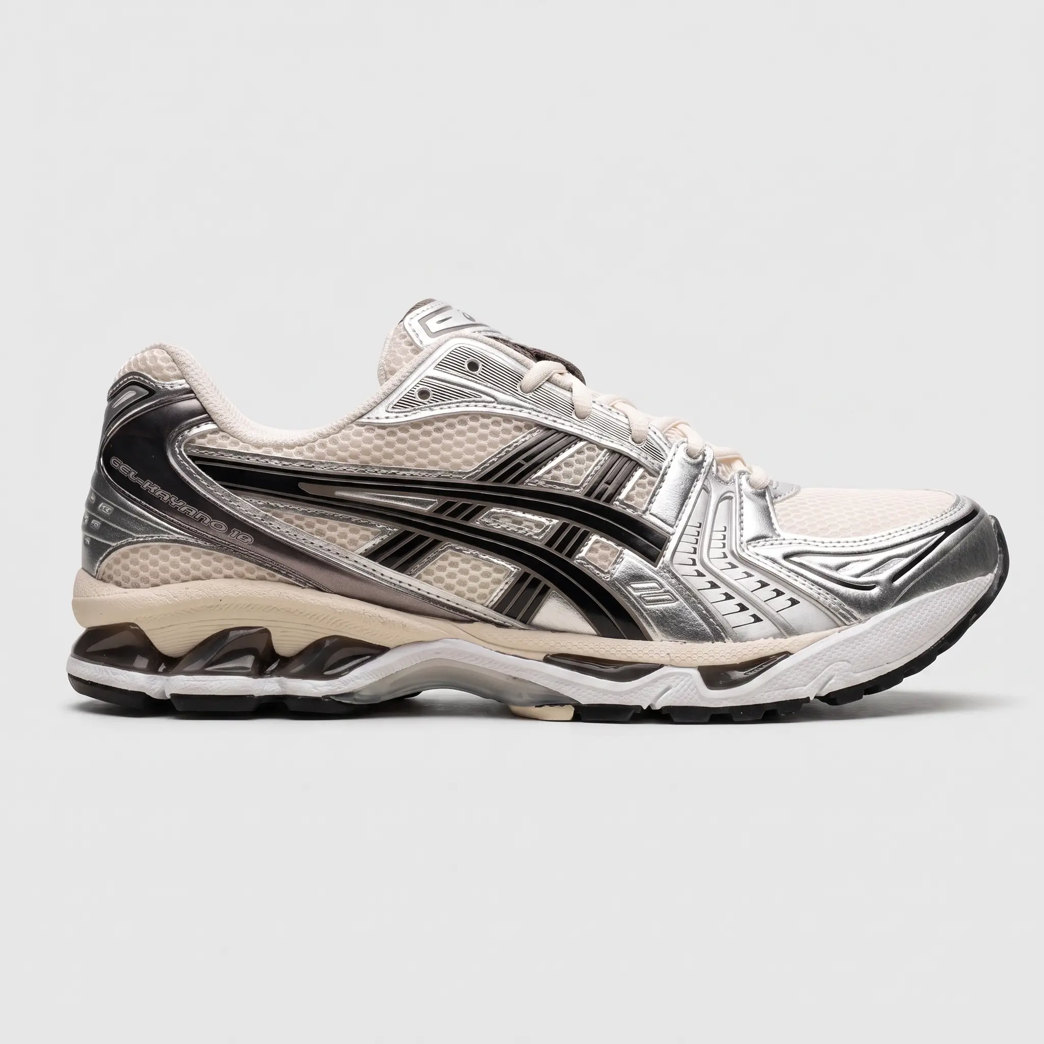 ASICS Gel-Kayano 14 Cream Black Metallic Plum – Vista Lateral Interior ASICS Gel-Kayano 14 Cream Black Metallic Plum vista lateral interior.