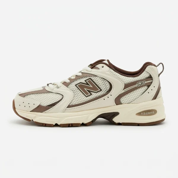 PÁGINA INICIAL New Balance 530 Turtledove, vista lateral com logótipo N em castanho e entressola ABZORB
