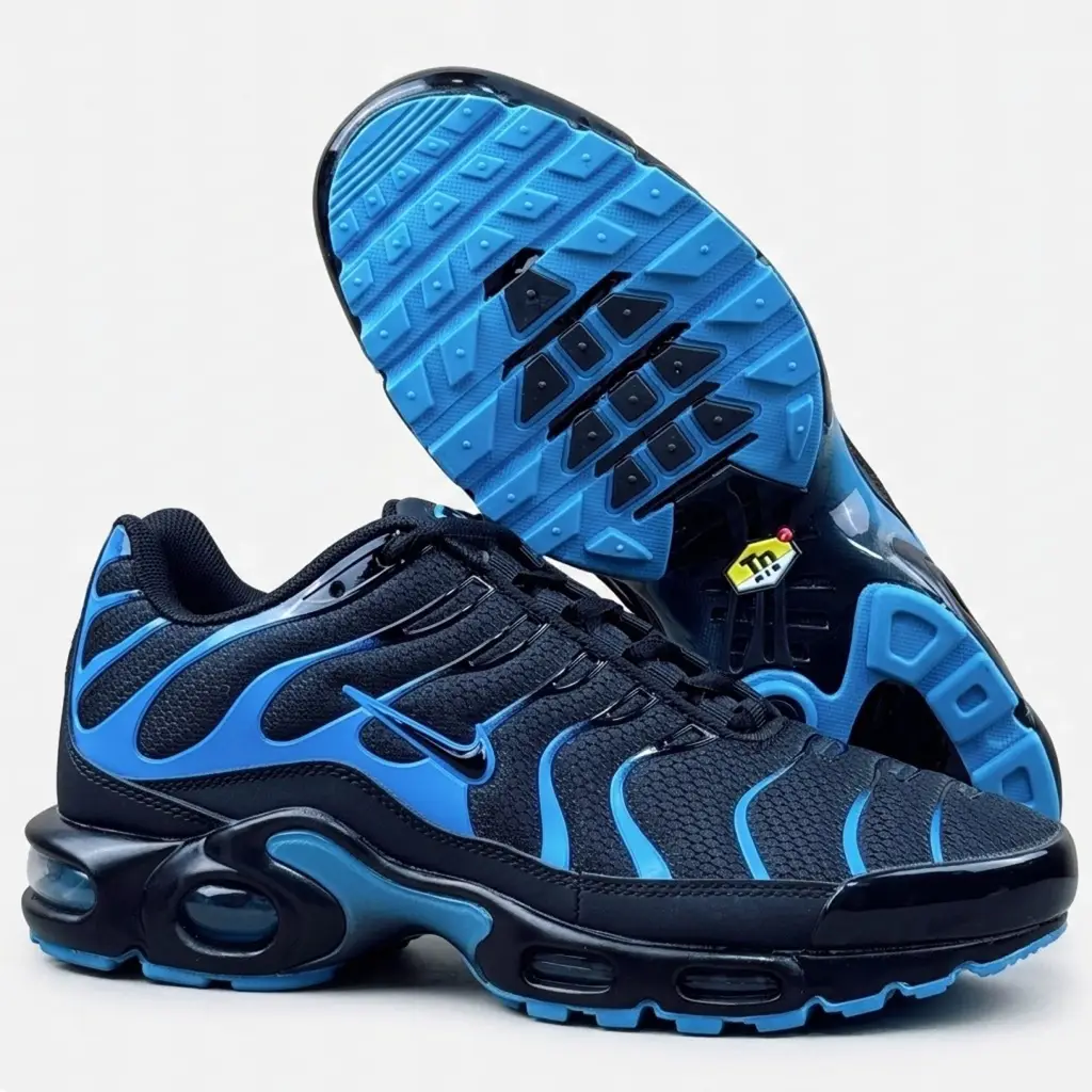 Nike Air Max Plus TN Preto e Azul Sola Tuned Air do Nike Air Max Plus TN preto e azul com padrão de tração