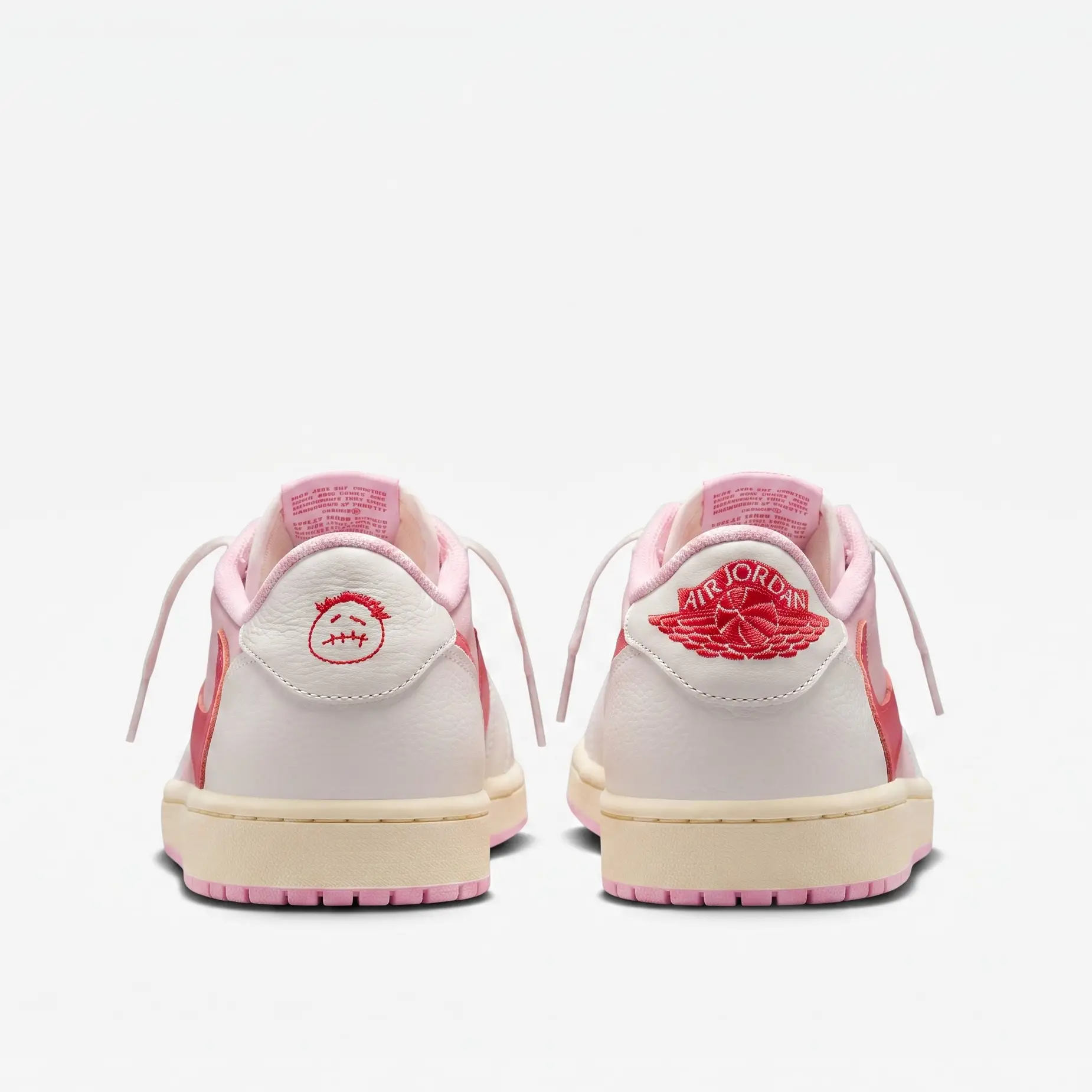 Air Jordan 1 Low Travis Scott Tropical Pink — Vista Traseira Air Jordan 1 Low Travis Scott rosa vista traseira com bordados exclusivos