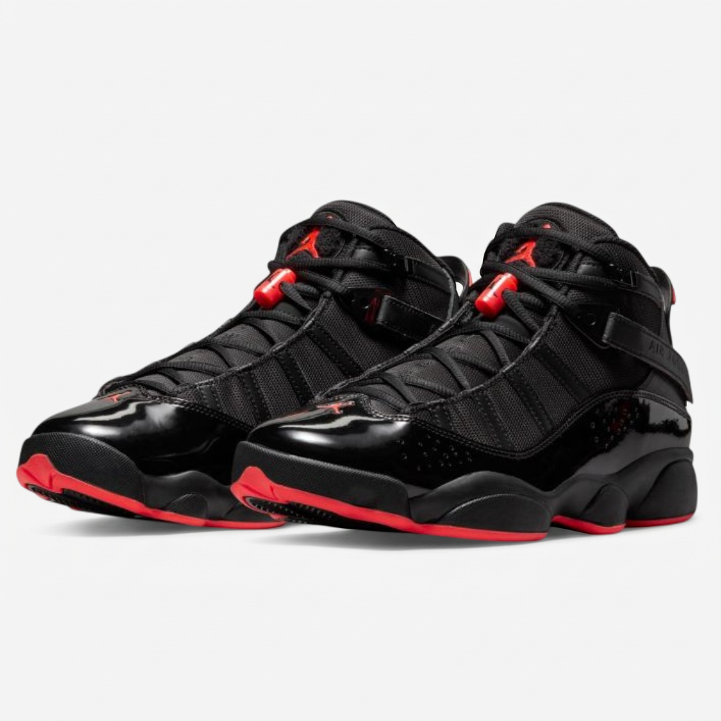 Jordan 6 Rings Black Infrared — detalhe da língueta Detalhe da língueta do Jordan 6 Rings Black Infrared com pele envernizada e Jumpman