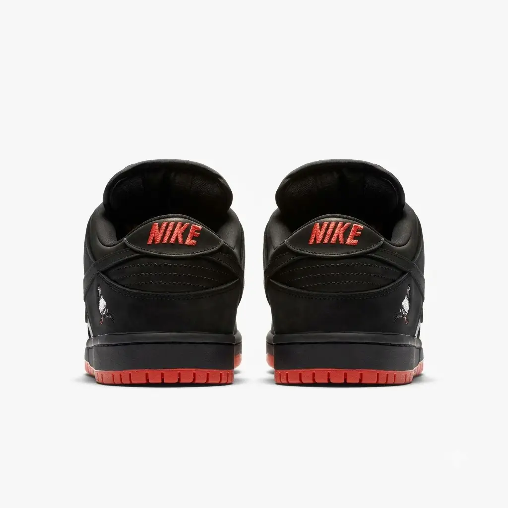 nike sb dunk low black pigeon — detalhes laterais Nike SB Dunk Low Black Pigeon vista superior com upper preto e língua acolchoada