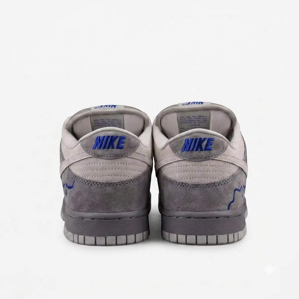 nike sb dunk low london — detalhe do tamisa vista traseira vorax Nike SB Dunk Low London com detalhe bordado do rio Tamisa no calcanhar