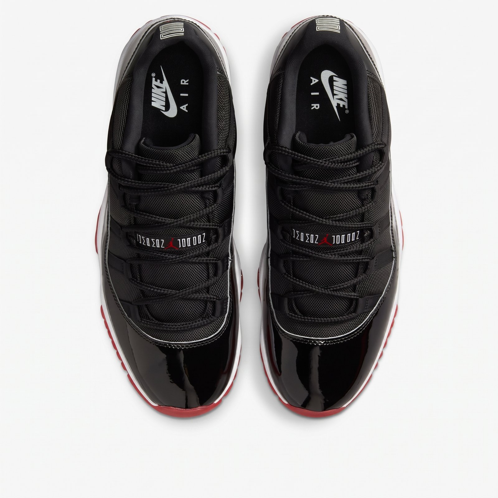 Air Jordan 11 Low Bred 2025 — sola translúcida vermelha Sola translúcida vermelha da Air Jordan 11 Low Bred 2025